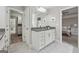 This bathroom offers dual access, with ample storage and counter space at 733 Wexford Cove Way, Mableton, GA 30126
