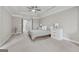 Bright main bedroom featuring a neutral palette, carpet flooring, and classic furnishings at 733 Wexford Cove Way, Mableton, GA 30126