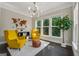 Bright office features large windows, stylish lighting, and unique decor accents at 733 Wexford Cove Way, Mableton, GA 30126