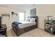 Bedroom with neutral walls, carpet, and decorative shelves at 117 Elkins Blvd, Locust Grove, GA 30248