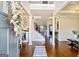 Spacious foyer with high ceilings, hardwood floors, and elegant decorative details at 117 Elkins Blvd, Locust Grove, GA 30248