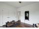 View of the exercise room showing the hardwood floors and fitness equipment at 1952 Sugarstone Dr, Lawrenceville, GA 30043