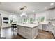 Modern kitchen with a large island, stainless steel appliances, and plenty of cabinet space at 1952 Sugarstone Dr, Lawrenceville, GA 30043