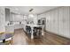 Bright kitchen with stainless steel appliances and an island with seating, great for cooking and dining at 1952 Sugarstone Dr, Lawrenceville, GA 30043