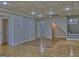 Spacious finished basement area with parquet floors, recessed lighting, and multiple doorways at 902 Sweetbay Ct, Stockbridge, GA 30281