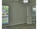 Bedroom featuring wood floors, a ceiling fan, and an attached bathroom at 902 Sweetbay Ct, Stockbridge, GA 30281