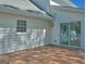 Exterior image showing a wooden deck with a sliding glass door and white siding at 902 Sweetbay Ct, Stockbridge, GA 30281