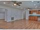 Spacious living room with wood floors, recessed lighting, and ceiling fans at 902 Sweetbay Ct, Stockbridge, GA 30281