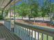 Scenic view from the front porch showcasing the peaceful neighborhood and mature trees at 902 Sweetbay Ct, Stockbridge, GA 30281