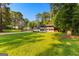 Spacious front yard with a two-story home featuring a manicured lawn and ample space at 103 Chipstone Ct, Peachtree City, GA 30269