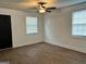 Bedroom showcasing natural light, two windows and a stylish ceiling fan at 1764 Cahoon Sw St, Atlanta, GA 30310