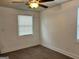 Bedroom with wood-look flooring and a bright, airy feel from the windows at 1764 Cahoon Sw St, Atlanta, GA 30310
