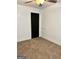 Bedroom featuring a carpeted floor and a black door at 1764 Cahoon Sw St, Atlanta, GA 30310