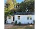 Charming single-story home featuring a freshly painted white exterior at 1764 Cahoon Sw St, Atlanta, GA 30310
