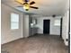Bright living room with updated flooring and a ceiling fan for comfort at 1764 Cahoon Sw St, Atlanta, GA 30310