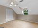 Upstairs bedroom with wood floors, neutral walls, a window and closet for storage at 778 Leguin Mill Rd, Locust Grove, GA 30248