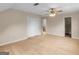 Spacious bedroom featuring wood floors, a ceiling fan, and a closet at 778 Leguin Mill Rd, Locust Grove, GA 30248