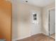 View of room with access door leading to the exterior at 778 Leguin Mill Rd, Locust Grove, GA 30248
