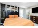 Bedroom showcasing a decorative wall, large bed, and ensuite bathroom at 1147 Dunivin Dr, Jonesboro, GA 30238