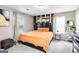 Cozy bedroom featuring a queen bed with elegant headboard and modern accents at 1147 Dunivin Dr, Jonesboro, GA 30238