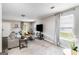 Inviting living room with neutral tones, plush carpeting, and natural light at 1147 Dunivin Dr, Jonesboro, GA 30238