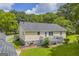 Charming home with a well-maintained deck and landscaped yard, perfect for outdoor enjoyment at 3100 Meadow Trl, Loganville, GA 30052