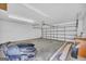 Spacious garage with a clean floor and an automatic door and room for storage at 3100 Meadow Trl, Loganville, GA 30052