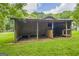Rustic wooden shed offering ample covered storage space in a lush green yard at 3100 Meadow Trl, Loganville, GA 30052