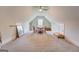 Expansive attic space with a table and chairs at 3076 East Lake Rd, Mcdonough, GA 30252