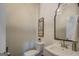 Charming powder room featuring shiplap walls, modern vanity, and decorative wall art at 3076 East Lake Rd, Mcdonough, GA 30252
