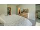 Bedroom with doorway views into connecting rooms at 3076 East Lake Rd, Mcdonough, GA 30252