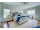 Comfortable bedroom with natural light from two large windows and stylish decor at 3076 East Lake Rd, Mcdonough, GA 30252