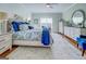 Bright bedroom with natural light, complemented by white furnishings and stylish decor at 3076 East Lake Rd, Mcdonough, GA 30252