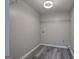 Closet featuring modern flooring, shelving, and neutral-colored walls at 400 Kenny Ln, Temple, GA 30179
