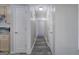 Long hallway with doors leading to different rooms of the house at 400 Kenny Ln, Temple, GA 30179