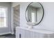 Stylish hallway with modern console table, mirror, and light fixtures at 292 Oliver Dr, Locust Grove, GA 30248