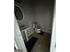 Bathroom with pedestal sink, toilet, blue bathmat, and tile flooring at 11313 Michelle Way, Hampton, GA 30228
