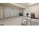 Spacious garage features a clean, light-colored floor, a large door, and ample space for storage at 1001 Hartwell Rd, Locust Grove, GA 30248