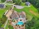 Spacious property featuring a custom pool, lush landscaping, and a long driveway at 1422 New Holland Cir, Mcdonough, GA 30252