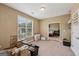 Bedroom with natural light, carpet, and an adjacent connected bedroom at 1422 New Holland Cir, Mcdonough, GA 30252