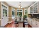Charming breakfast nook with windows, dining table, and bright natural light at 1422 New Holland Cir, Mcdonough, GA 30252