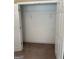 Large bedroom closet with carpeted floors at 1422 New Holland Cir, Mcdonough, GA 30252