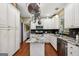 Well-equipped kitchen with stainless steel appliances, granite countertops, and a kitchen island at 1422 New Holland Cir, Mcdonough, GA 30252