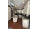 Spacious kitchen featuring granite countertops, stainless steel appliances, and white cabinets with dark hardware at 1422 New Holland Cir, Mcdonough, GA 30252