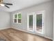 Bedroom with modern flooring, ceiling fan, and natural light at 3135 Journal Ct, Decatur, GA 30035