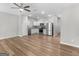 This open kitchen features stainless steel appliances and bright, neutral finishes at 3135 Journal Ct, Decatur, GA 30035