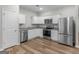 Well-equipped kitchen with stainless steel appliances and ample cabinet space at 3135 Journal Ct, Decatur, GA 30035