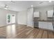 Spacious living room with modern flooring and a door to the outside at 3135 Journal Ct, Decatur, GA 30035