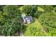 Charming two-story home featuring a private backyard swimming pool and lush landscaping at 135 Cherokee Pl, Fayetteville, GA 30215