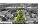 Aerial image showing the property lines outlining the home, pool, and surrounding land at 135 Cherokee Pl, Fayetteville, GA 30215